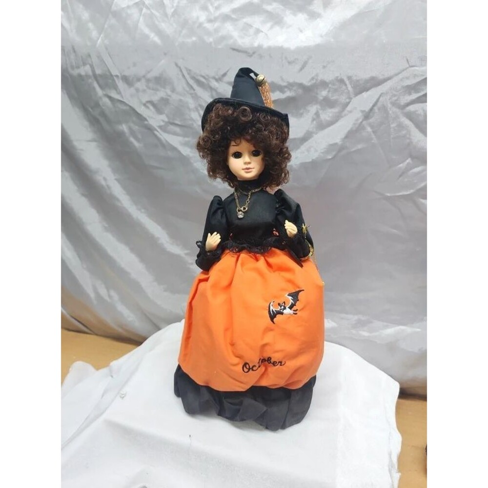 Brinn music box calendar doll October